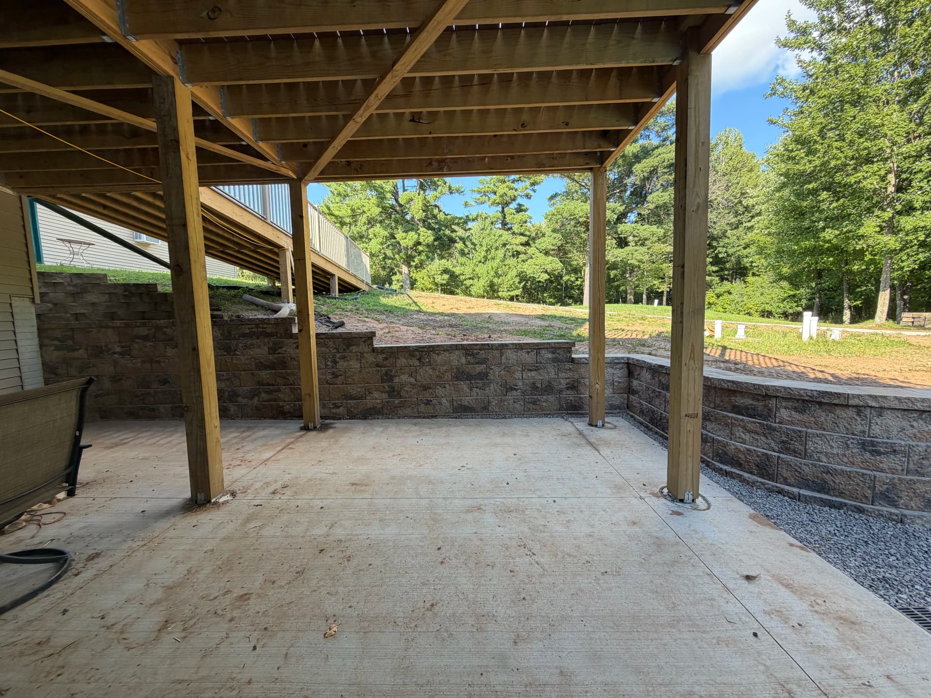 Old Retaining Walls Replaced With Two Solid New Ones Around Pool and Patio