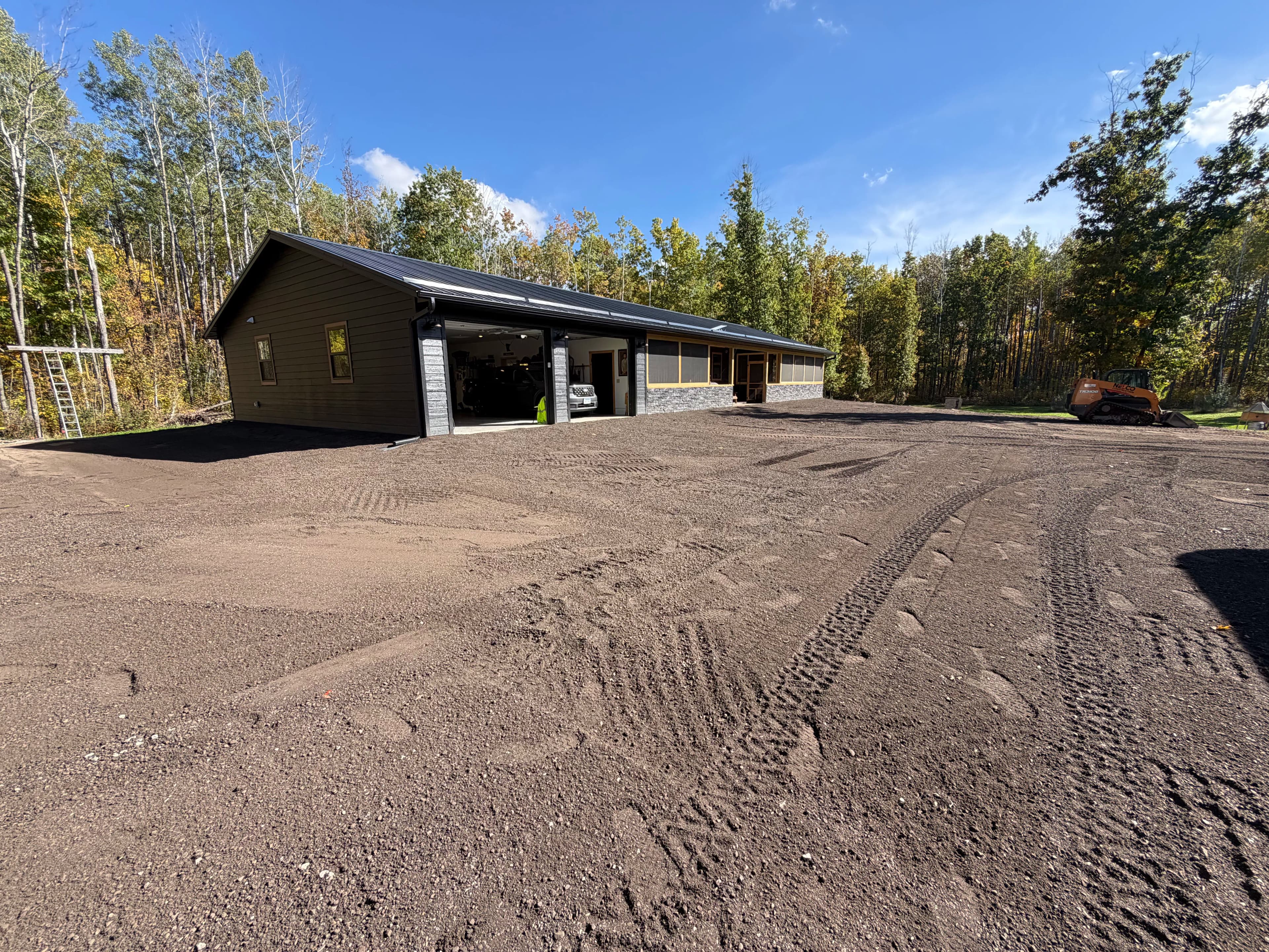 Project 60 Tons of Asphalt Millings Graded Into a Rock-Solid Surface image