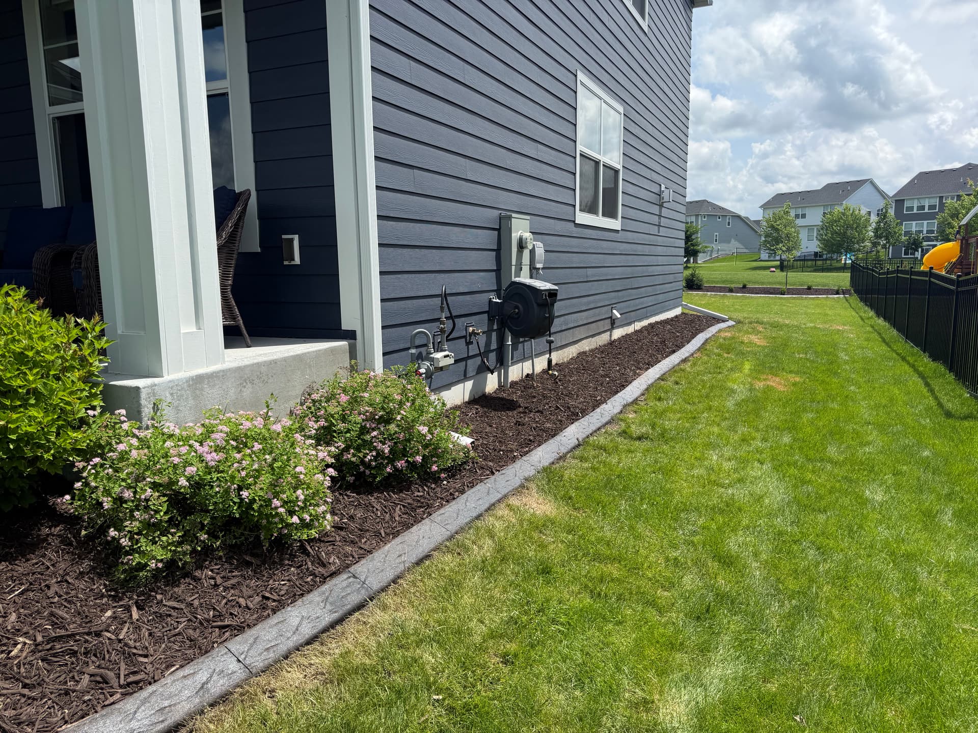 Gallery photos for Concrete Curbing and Mulch Beds Done Right in Maple Grove: Image #2