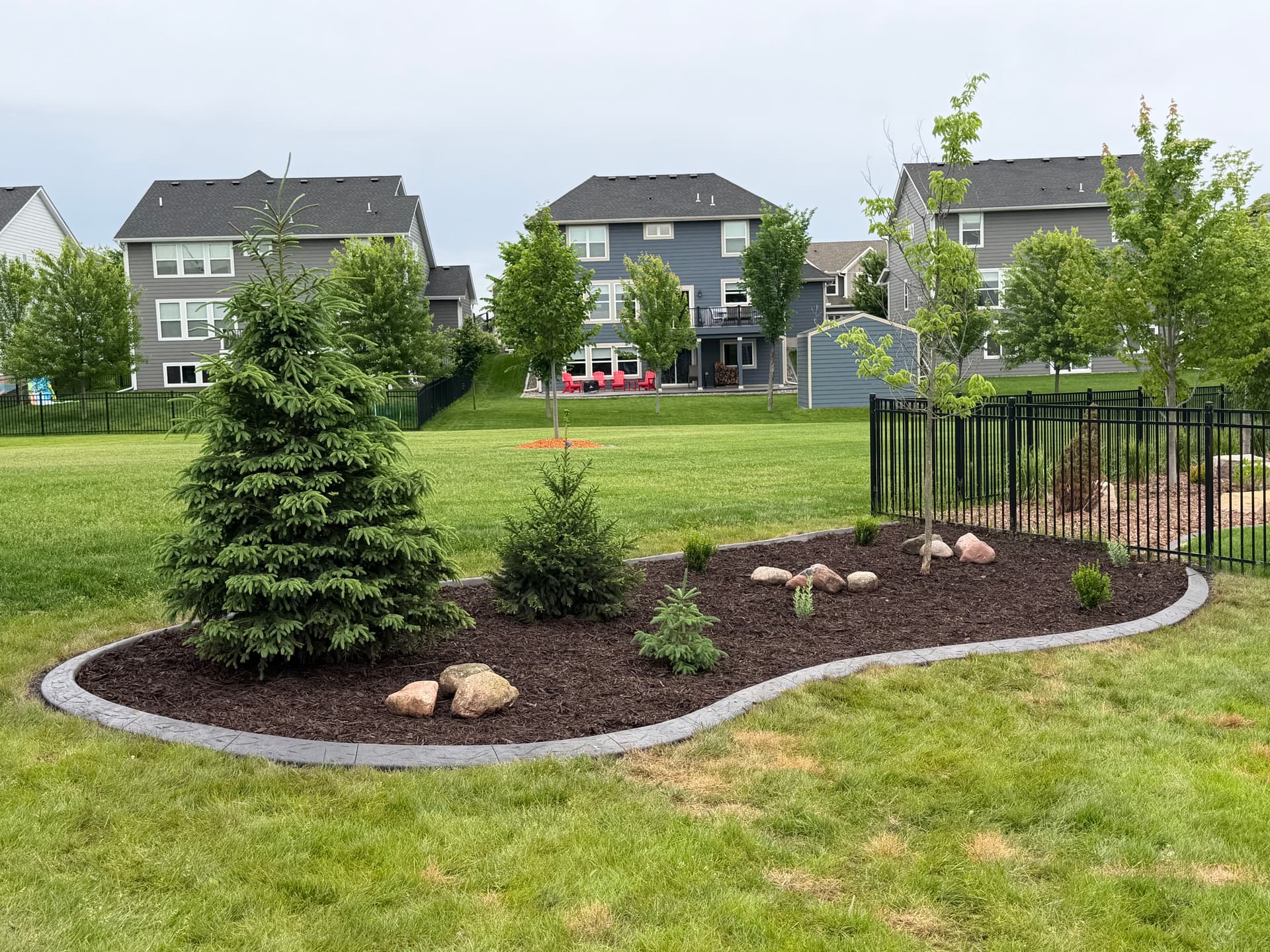 Gallery photos for Concrete Curbing and Mulch Beds Done Right in Maple Grove: Image #1