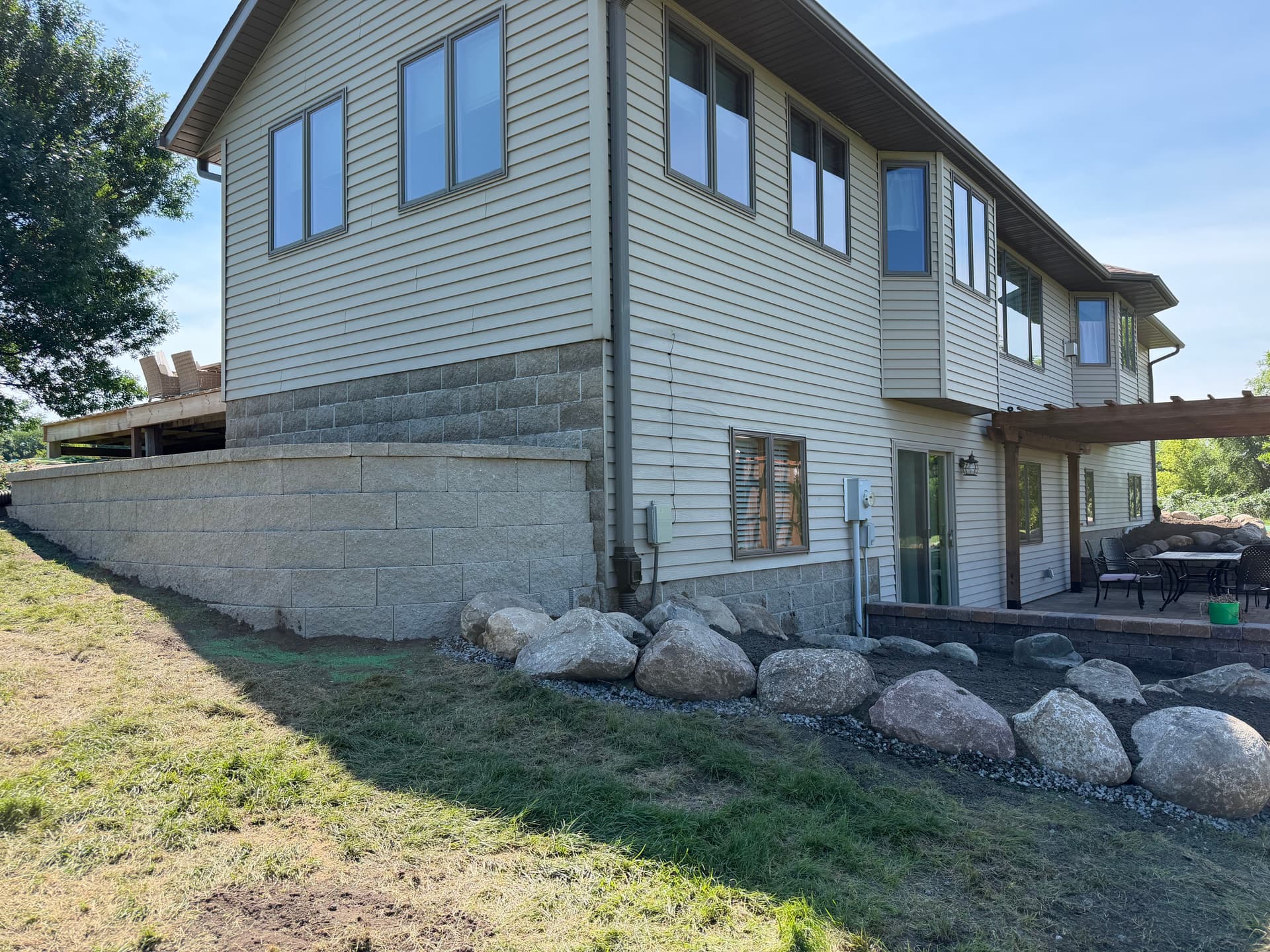 Retaining Wall and Boulder Flower Bed Build in Clear Water MN image